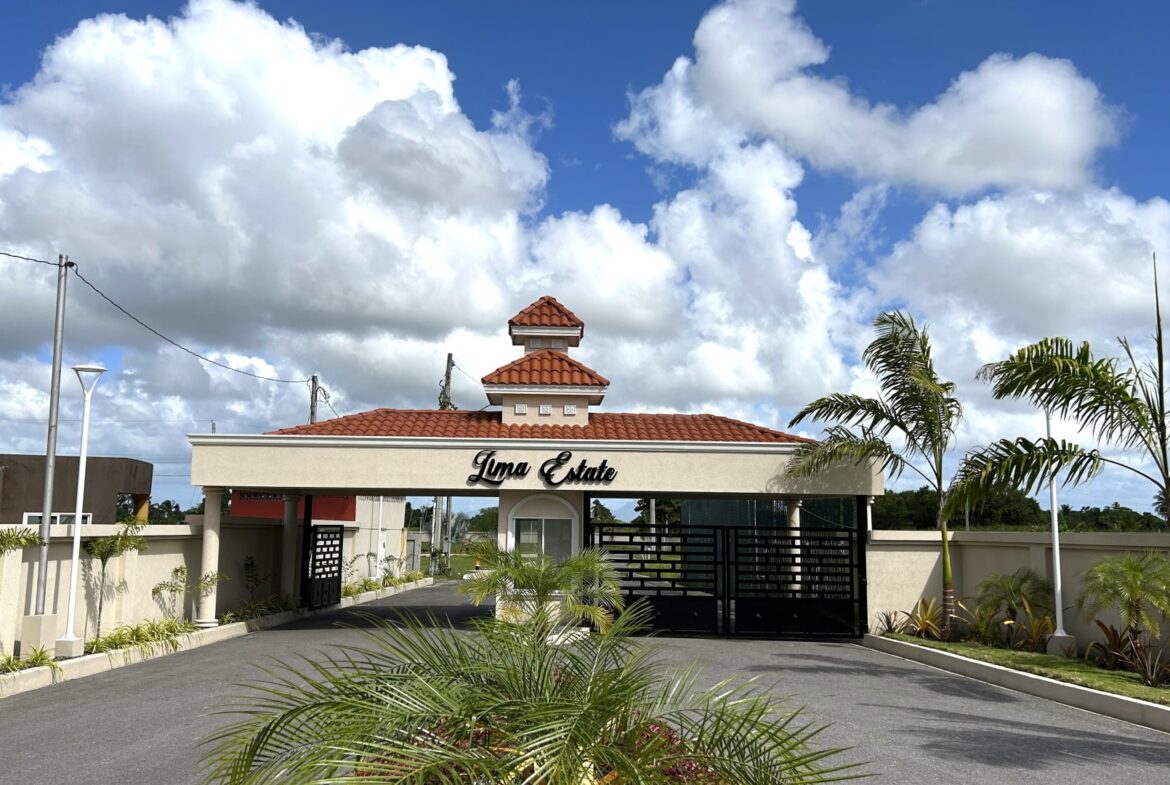 Gated entrance to Lima Estates, a modern Freeport community with new homes for sale.