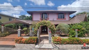 Photo of a luxurious 5 bedroom home for sale in Serenity Park, Charlieville, featuring a large patio and covered parking.
