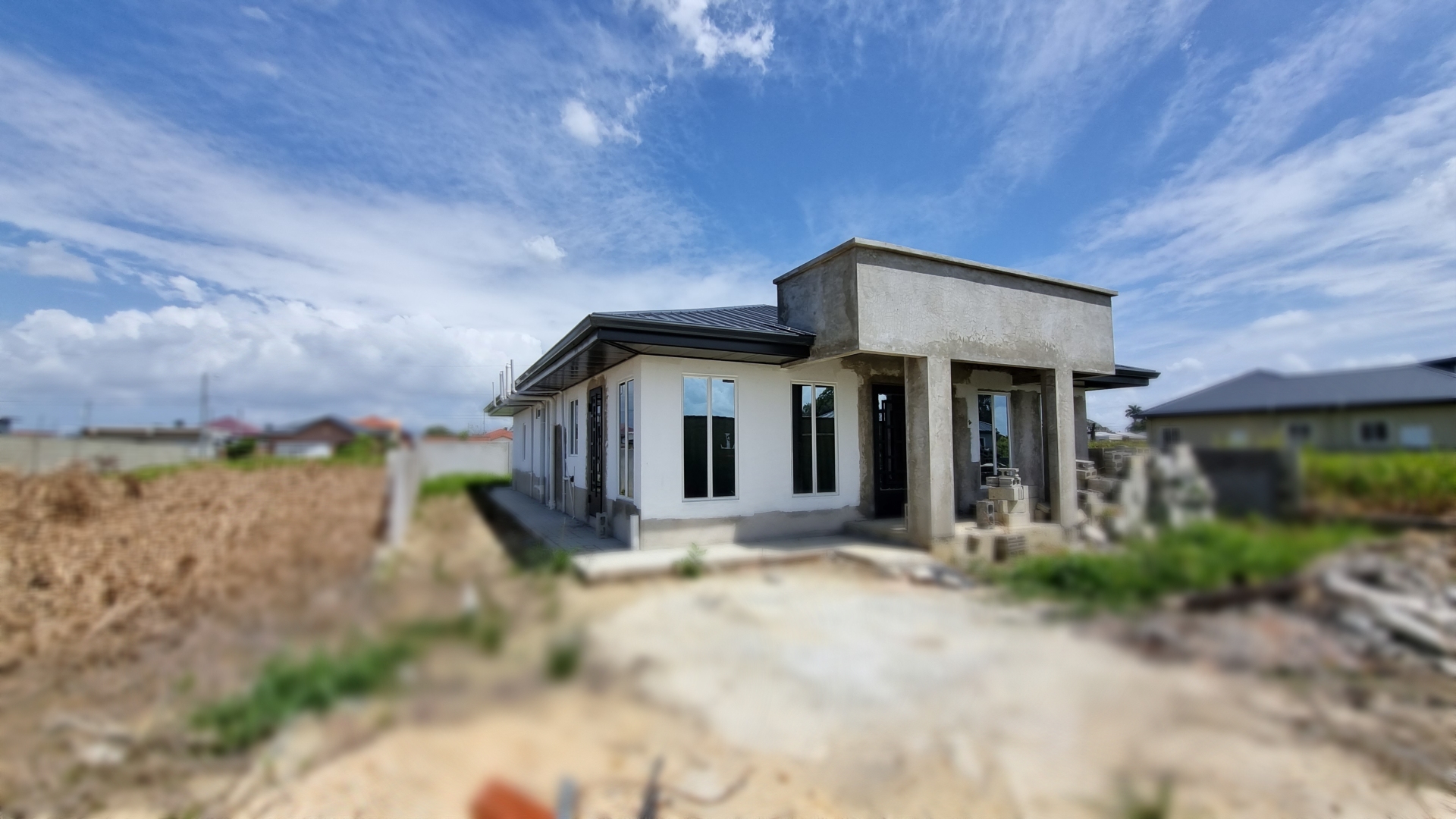House for sale in Chaguanas 3 bedroom Woodford Gardens Front aerial view