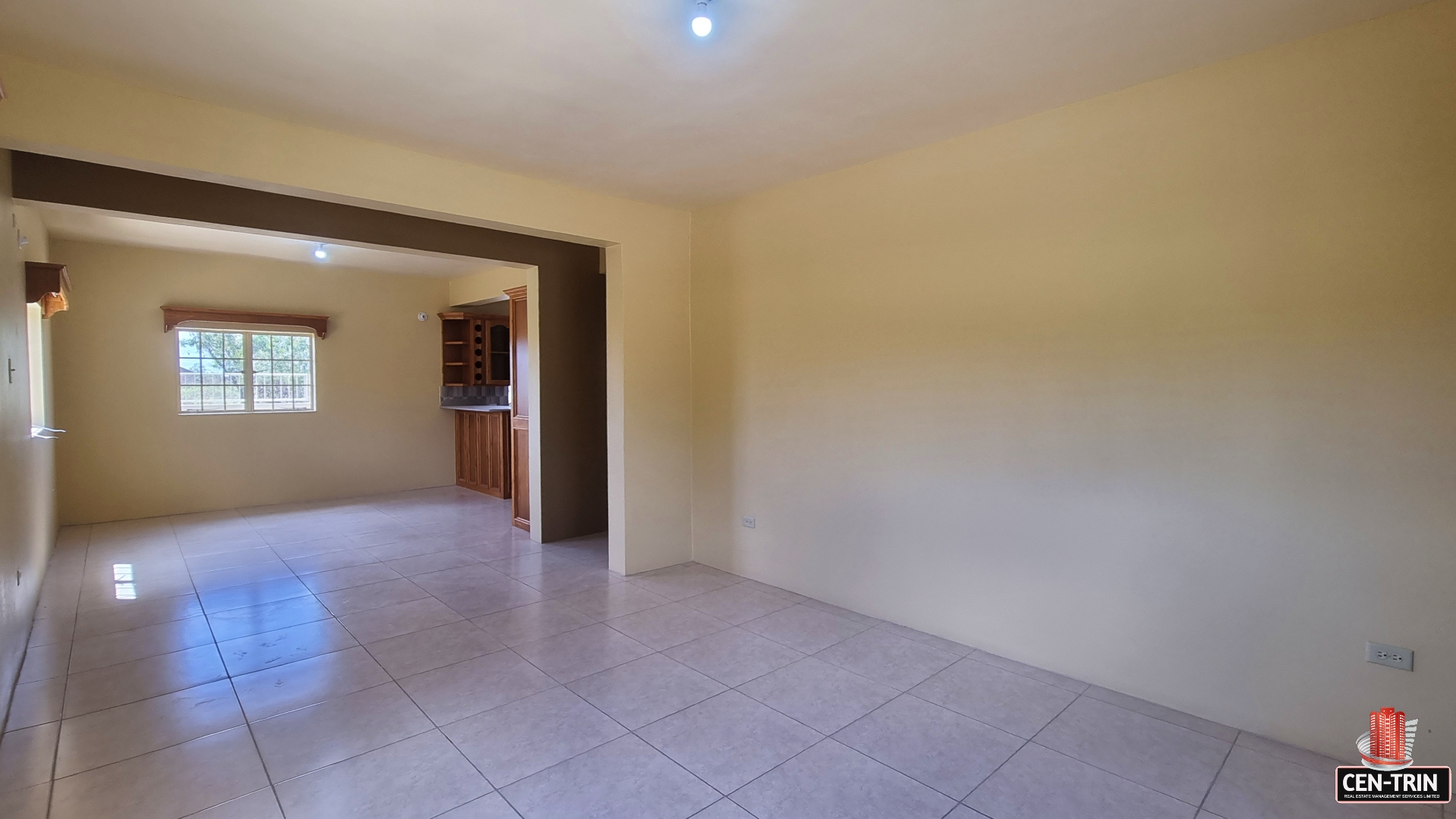 Takaaful Gardens Unfurnished open floor living and dining room area
