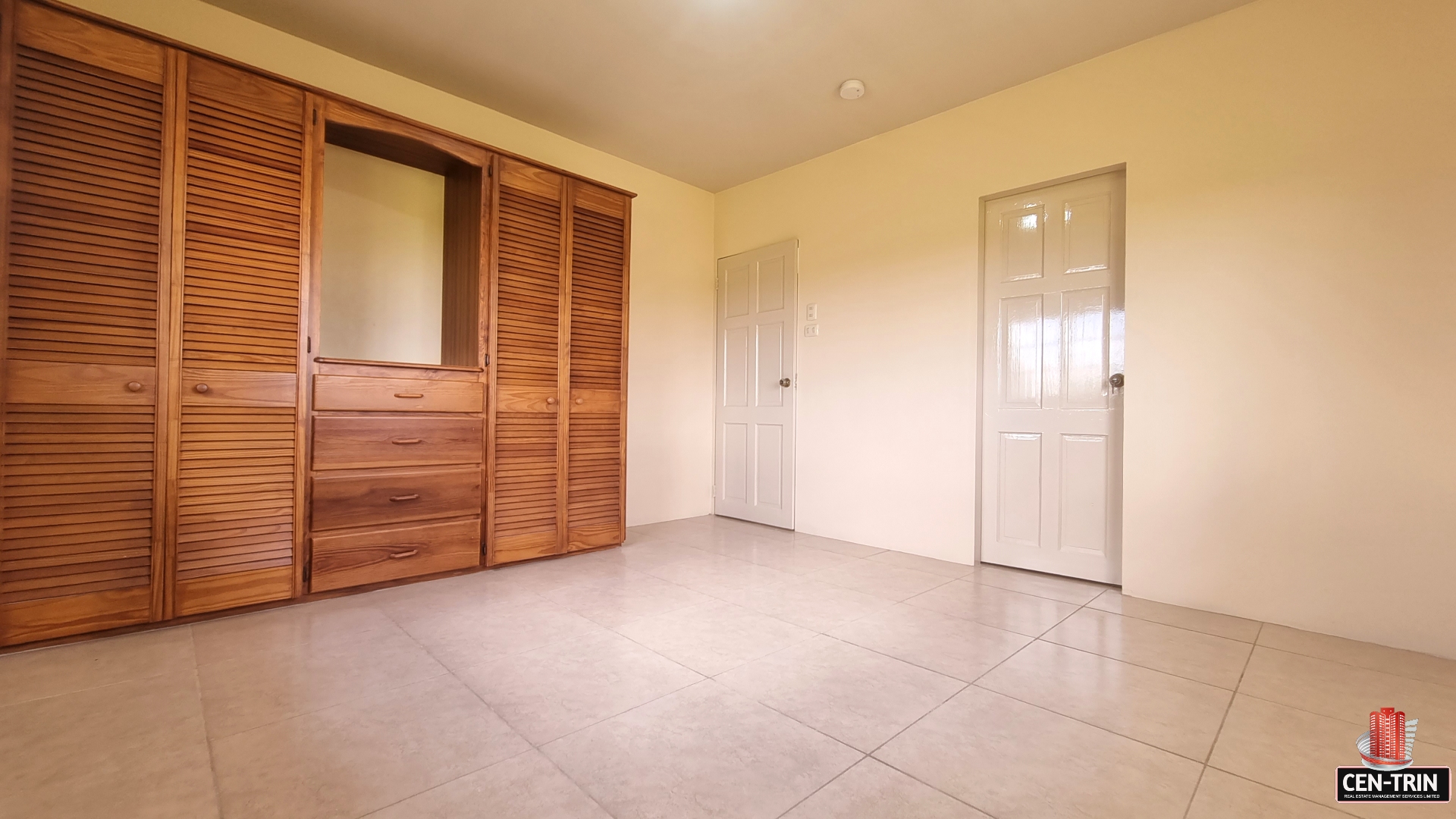 Bedroom in townhouse for sale with closet.
