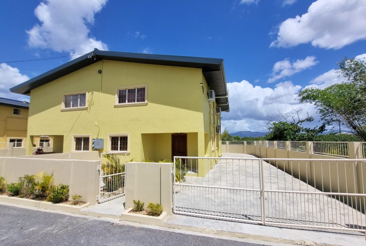 Townhouse for sale with gated driveway