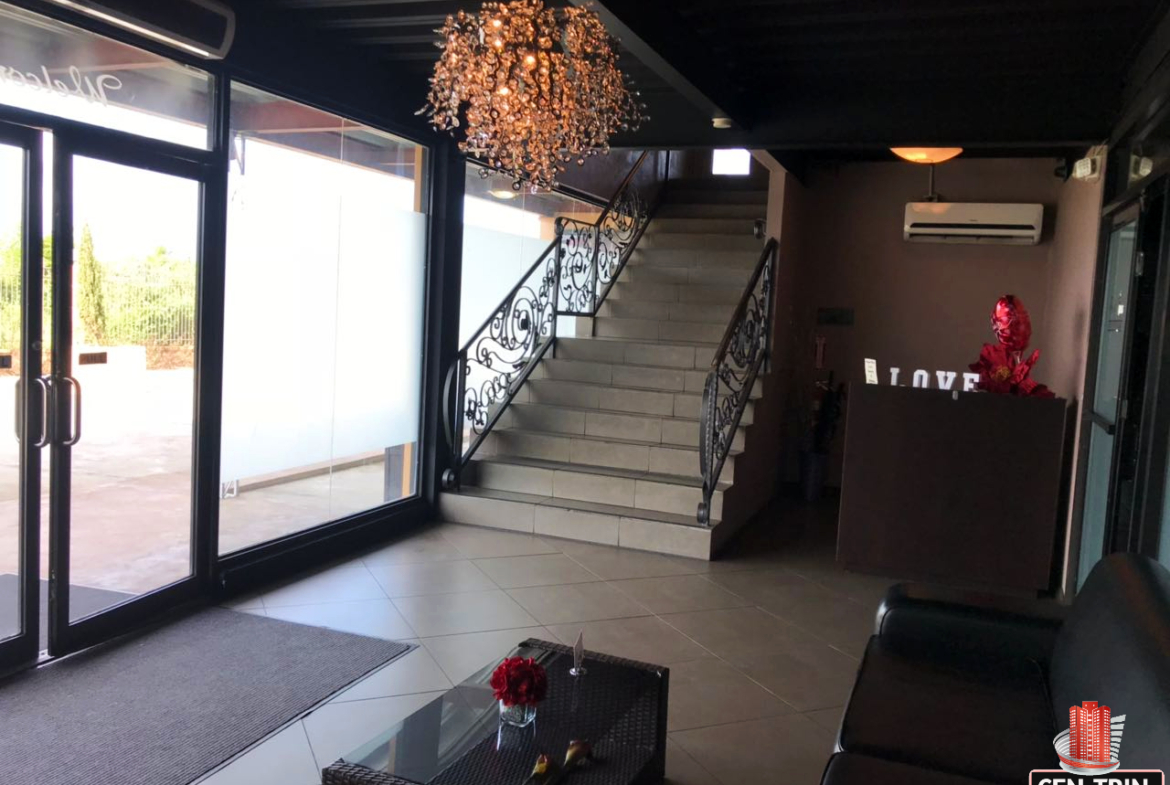 Modern commercial building in Calcutta Freeport, Trinidad, available for sale.