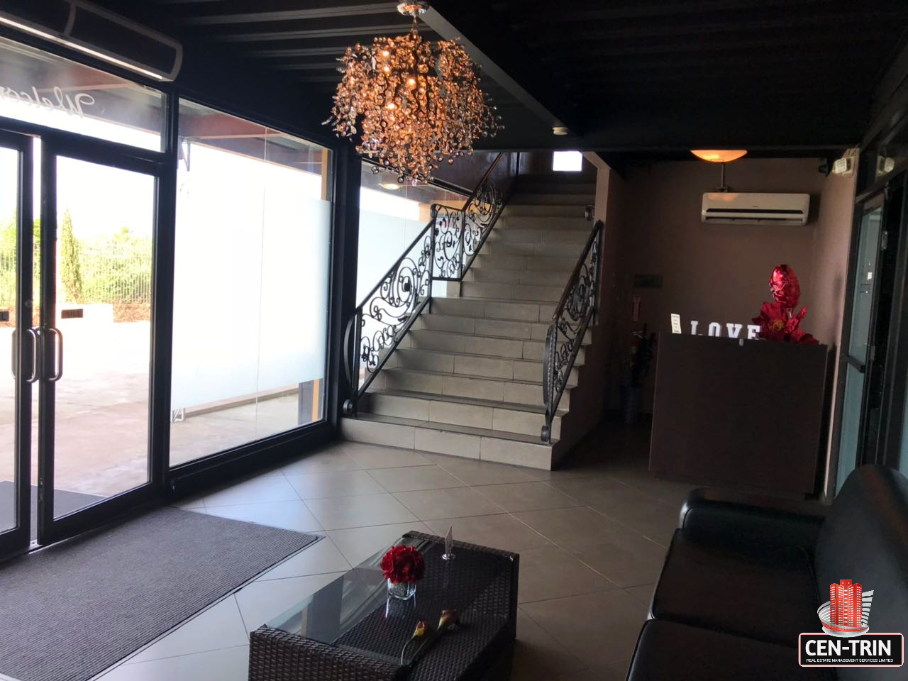 Modern commercial building in Calcutta Freeport, Trinidad, available for sale.