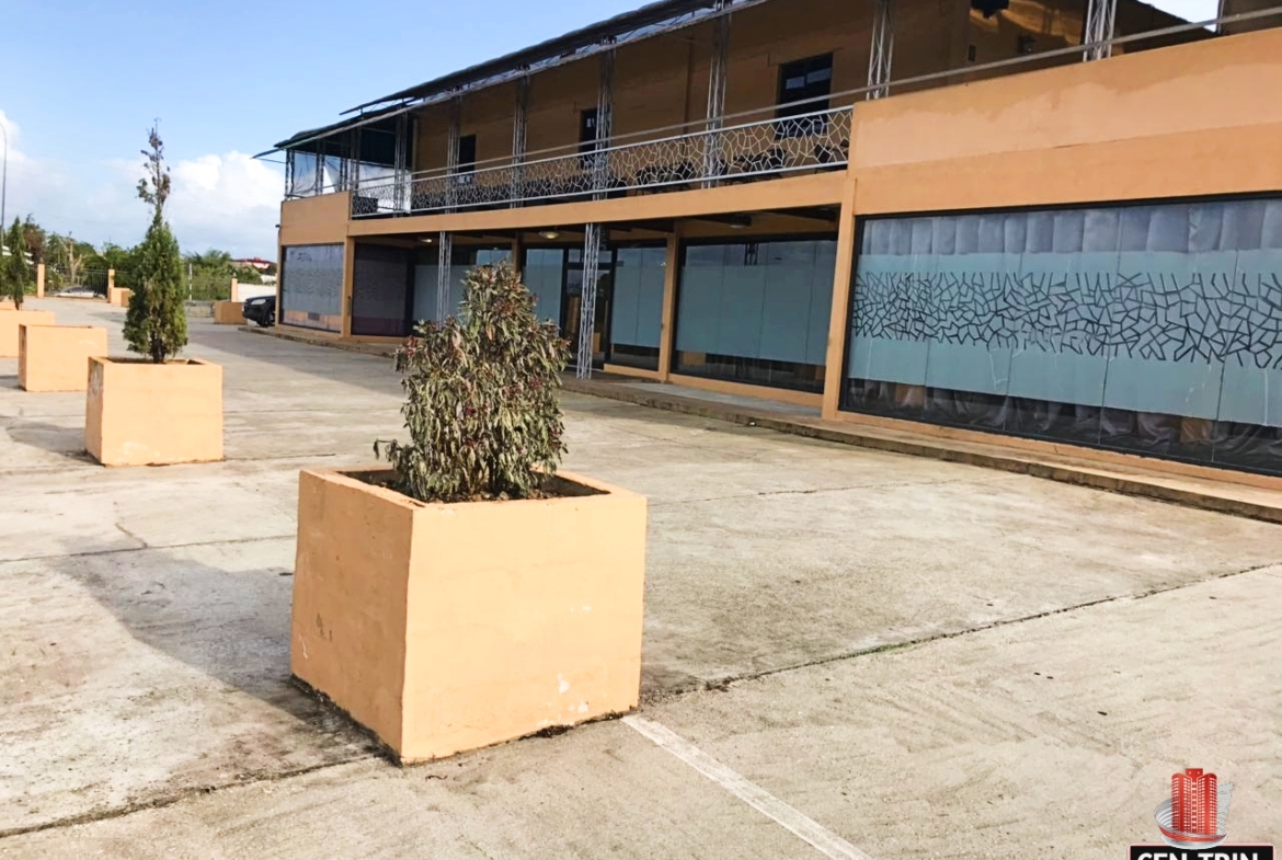 Front view of a commercial building for sale in Calcutta Freeport, Trinidad.