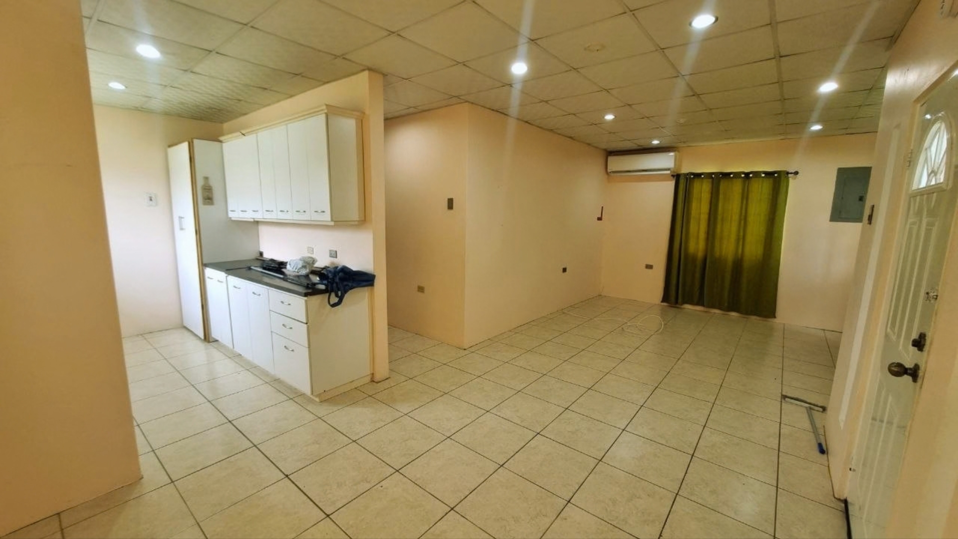 House for Rent | Eden Gardens, Freeport Open Living Room Air conditioned open concept living room and dining area in house for rent Eden Gardens Freeport