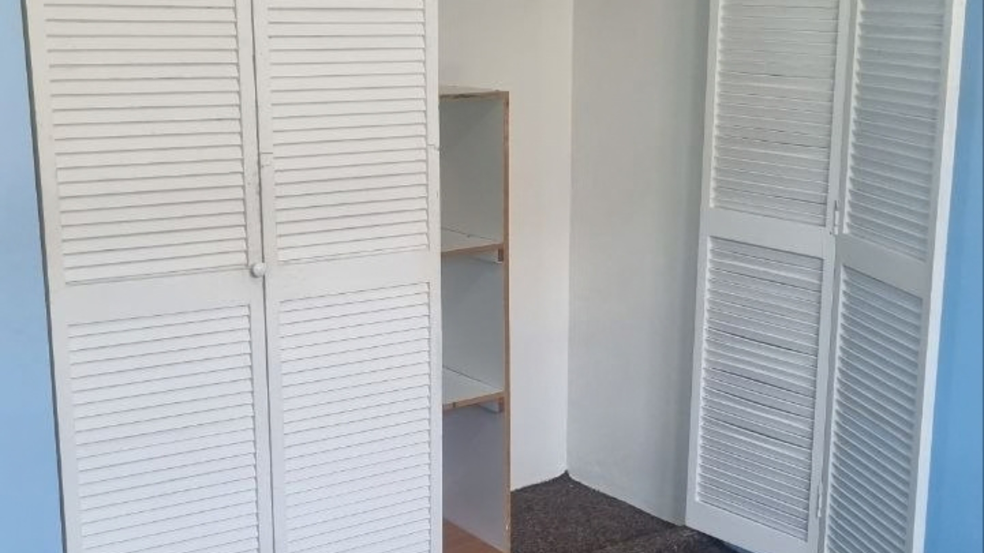 House for Rent | Eden Gardens, Freeport Built-In Closet White louvered built in wardrobe closet in 3 bedroom house for rent Eden Gardens Freeport